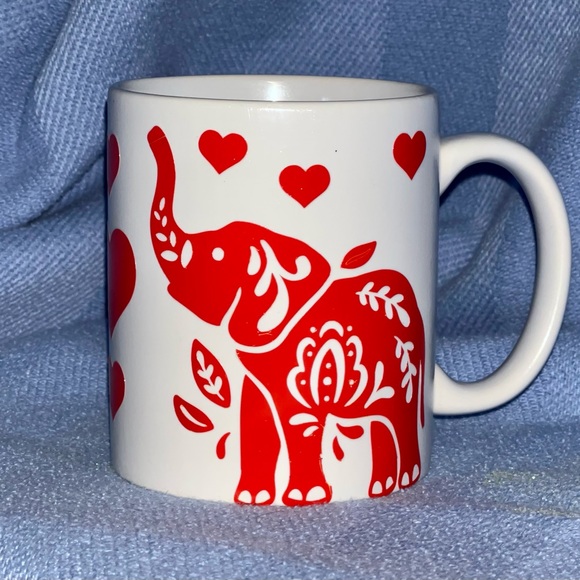 An elephant with its trunk turned upward is said to be good luck. - Picture 2 of 2